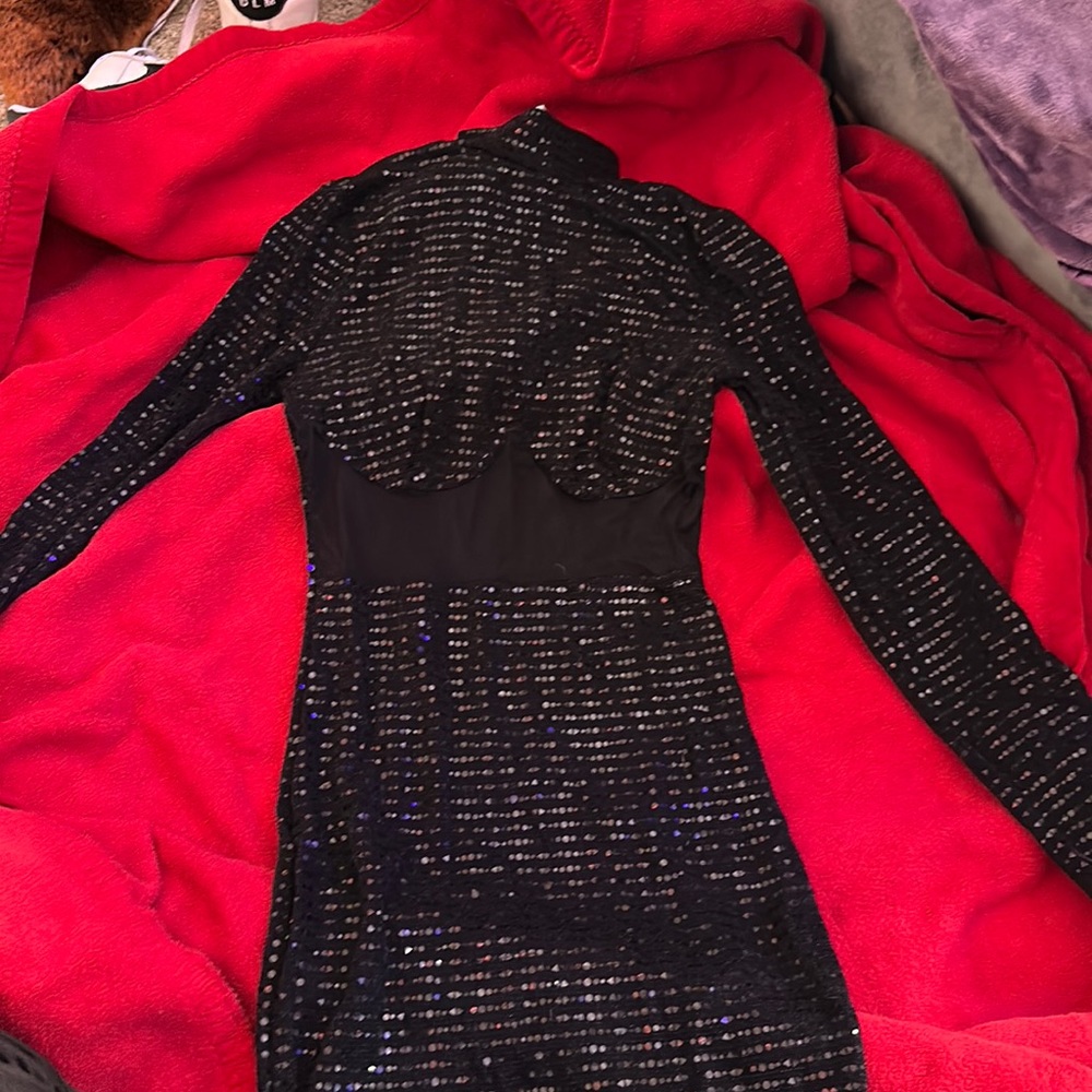 This is a fashion nova dress that has a mesh front it’s a size medium